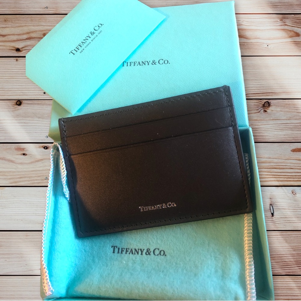 New in box Tiffany & Co black leather business card holder. Rare
